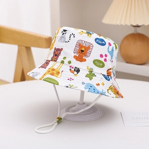 Detail of cartoon animal print kids sun hat with adjustable white wind rope on display
