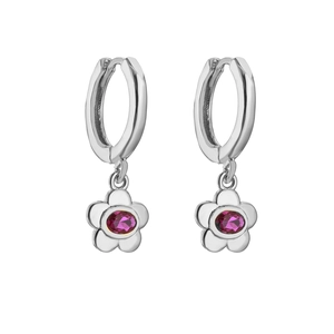 Detail of silver flower hoop earrings featuring a micro-set fuchsia red zircon stone