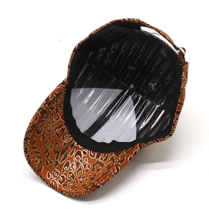 Detail view of leopard print baseball cap featuring inner sweatband and adjustable metal buckle