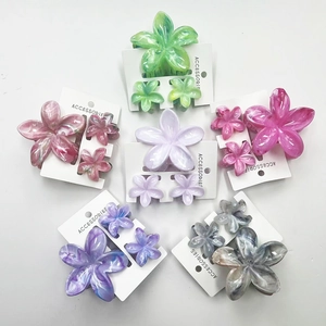 Frangipani flower hair claw clips set with marble texture and elegant acetate finish