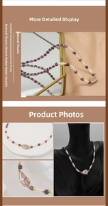 Detailed close-up of Baroque pearl necklace with purple amethyst and gold metal beads