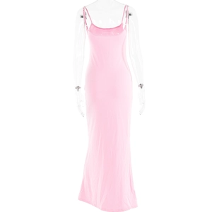 Detailed view of pink backless maxi dress showing smooth fabric and sleek fit on mannequin