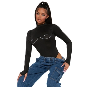 Detail of black turtleneck bodysuit featuring white anatomical print and high-stretch fabric