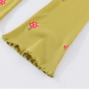 Yellow ribbed knit baby girl flared pants with cute red mushroom embroidery detail