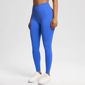 Close-up showing high-waisted wide waistband texture of royal blue seamless yoga leggings