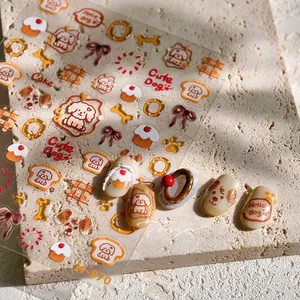 Detailed view of M-970 cute dog nail stickers with cartoon patterns and 3D jelly texture