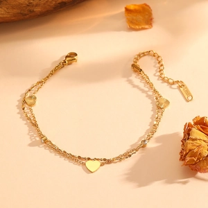 Bracelet double couche en acier inoxydable doré avec pendentif cœur et zircons brillants