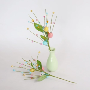 Easter decorative stems with pearl berries and colorful eggs in a green vase set