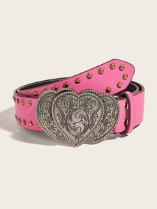 Detail of pink leather punk belt with silver heart double buckles and gold studs