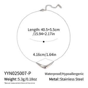 Detail showing dimensions and silver curved bar pendant on stainless steel necklace