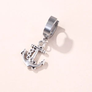 Detail of silver stainless steel hoop earring featuring a nautical anchor charm pendant