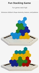 Macro view of colorful hexagonal wooden puzzle blocks stacked on a white honeycomb base