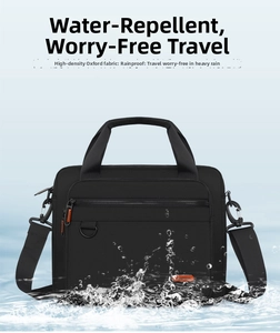 Close-up of waterproof black oxford fabric briefcase with dynamic water splashing effect