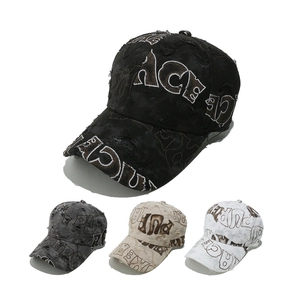Vintage distressed baseball cap with ripped letters in black, grey, beige and white colors