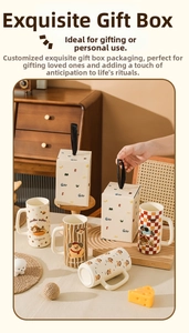 Detail of cute dog illustration ceramic mugs in premium gift boxes with leather handles