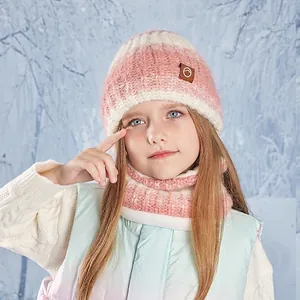 Pink and white striped winter knit hat and neck warmer set for children outdoors