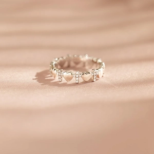 Elegant rose gold S925 silver ring featuring alternating heart and cross patterns with zircon