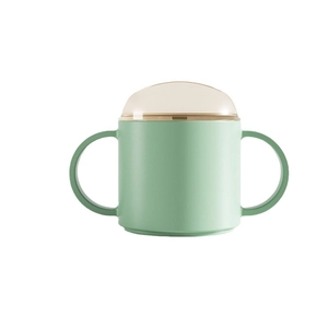 Green toddler learner cup with dual handles and transparent dome lid on white background