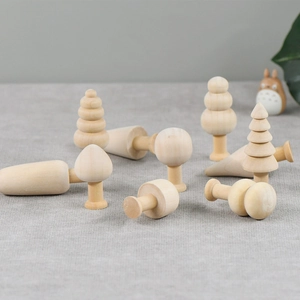 DIY unfinished wooden craft pieces including trees and mushrooms for home decor