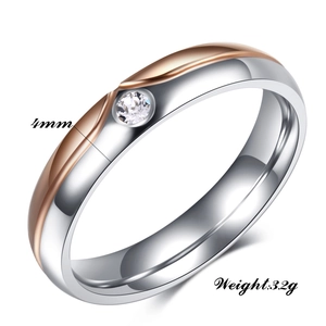 Detail of 4mm two-tone stainless steel ring with rose gold finish and inlaid zircon