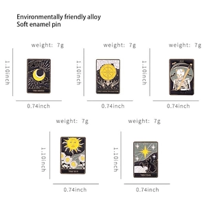 Five tarot enamel pins collection including moon and sun motifs in gold-tone metal alloy