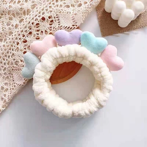 Plush beige headband with colorful macaron heart decorations for washing face