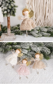 Détail de poupées anges de Noël en dentelle rose et blanche avec des ailes dorées