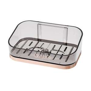 Modern smoke gray soap dish with rose gold trim and drainage holes for bathroom