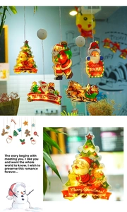 Detail of multi-color LED Christmas suction cup window lights featuring festive silhouettes