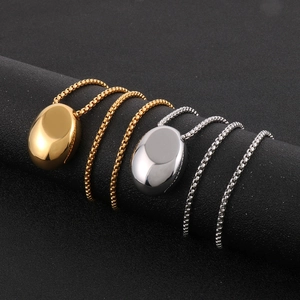 Polished stainless steel oval pendant necklaces in gold and silver with Boston chains