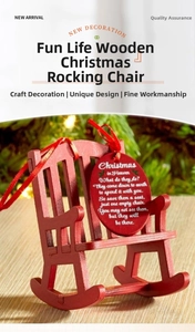 Macro shot of red wooden Christmas rocking chair ornament with memorial poem plaque