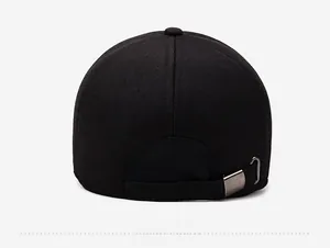 Detail view of the black winter baseball cap back with an adjustable metal buckle strap