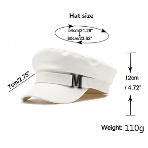 White PU leather newsboy hat with metal M logo and detailed size measurements chart