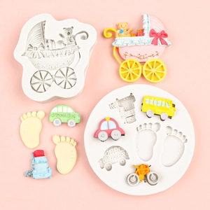 Silicone mold set for baby shower cake decorations including stroller and school bus shapes