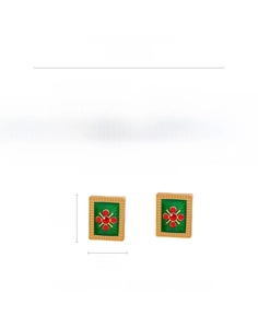 Macro shot showing 1.6cm x 1.3cm vintage gold earrings with green enamel and red rhinestones