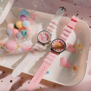 Detail of cute candy and cookies theme girls' watches with pastel silicone straps