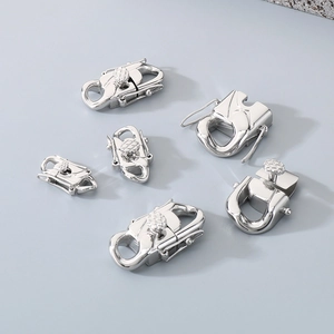 Polished silver stainless steel Cuban link clasp connectors in various sizes for jewelry