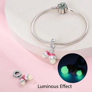 Luminous lily of the valley charm on a 925 silver plated snake chain bracelet