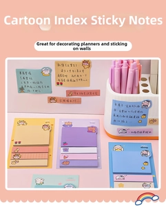 Detail of cute macaron-colored cartoon sticky notes featuring animal index labels and pads