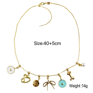 Golden DIY layered necklace with bow, pearl, and dog bone charms on adjustable chain