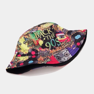 Detail of graffiti bucket hat featuring 90s retro cassette and radio patterns