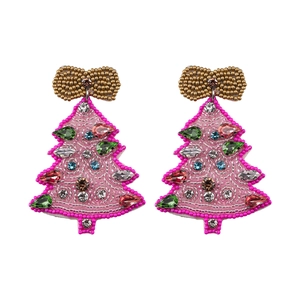 Close-up of pink beaded Christmas tree earrings with colorful rhinestones and gold bow