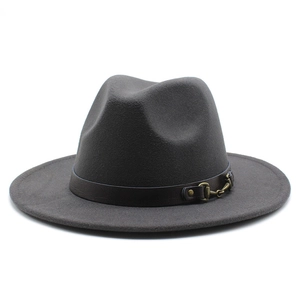 Detail of dark gray wool fedora hat with brown leather band and gold horsebit buckle