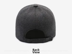 Detail view of the back of a thick grey wool baseball cap with adjustable metal buckle