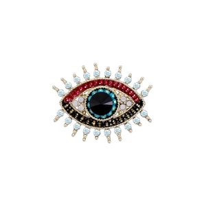Vintage-Brosche Auge des Bösen mit blauen Kristallen und vergoldeter Legierung im Boho-Stil