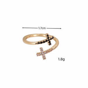 Cross-shaped open ring with cubic zirconia stones in gold-plated copper for women