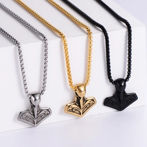 Viking Thor Hammer Mjölnir pendant necklaces in silver, gold, and black steel