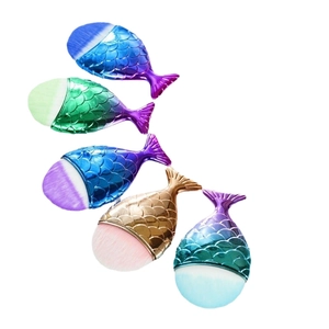 Set of 5 colorful mermaid tail makeup brushes with metallic gradient handles and soft bristles