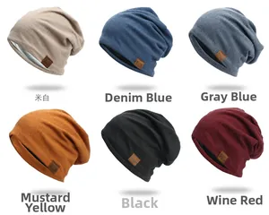 Detail showing knit beanies in six colors with F&S leather patch in soft knit fabric