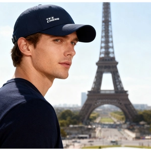 Detail of navy blue breathable mesh baseball cap with white TKZ CHENG logo and metal buckle